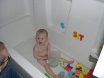 Nicky enjoying his first big-boy bath in our tub