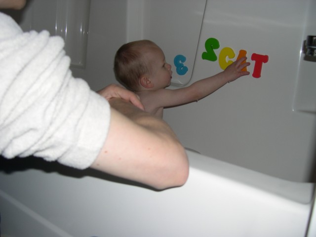 Nicky likes to spell in the bathtub