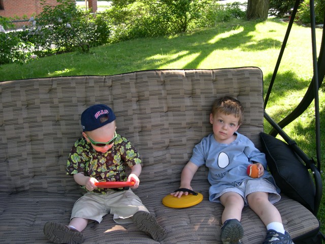 Nicky and Ben on the swing and Kris and Ang's house