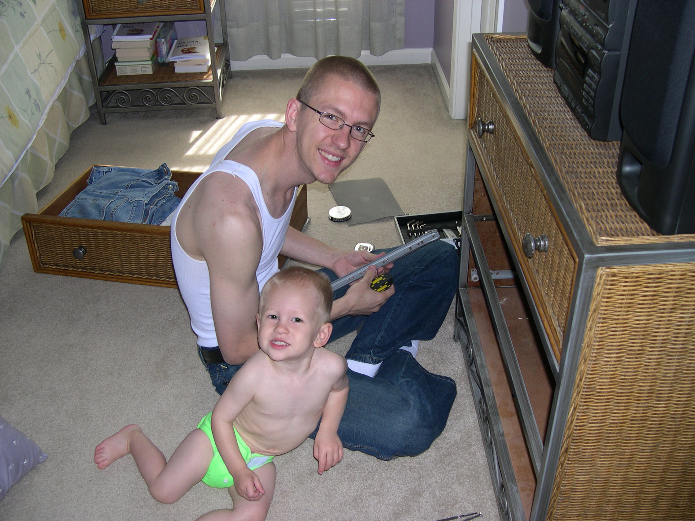 Nicky and Daddy fixing the dresser drawer