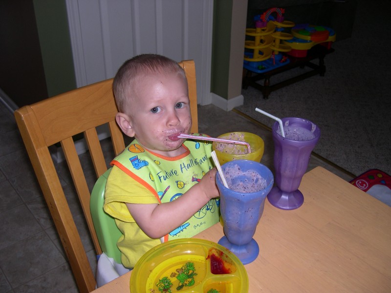 Finishing Daddy's smoothie