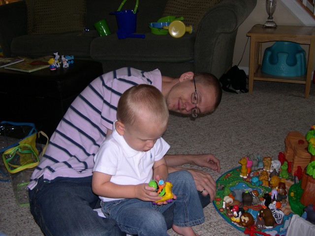 Daddy and Nicky playing with the zoo