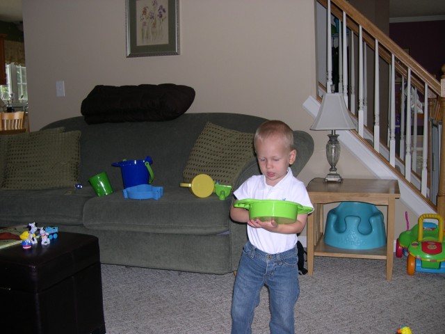 Nicky playing with his sifter