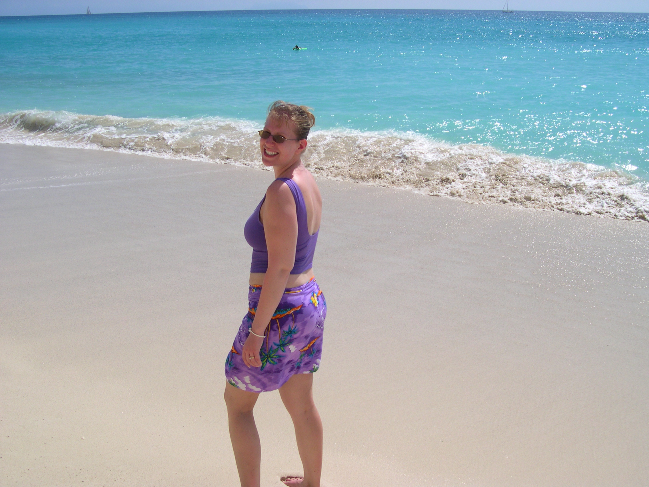 Jen walking on the beach towards the end of the runway