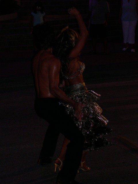 One of the sets of dancers, still in the street