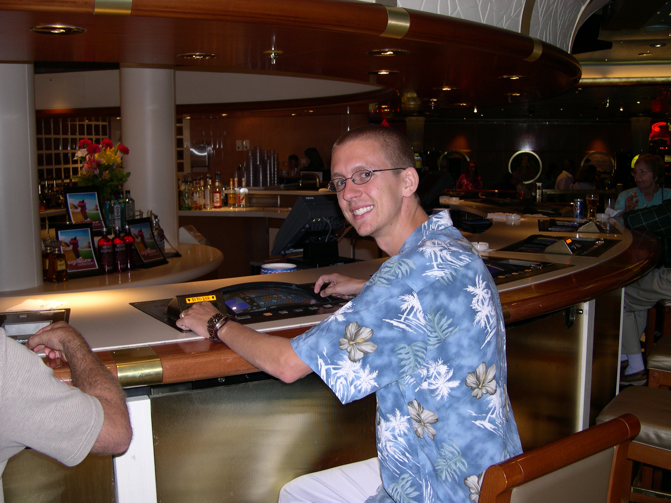 Chuck playing poker at the bar