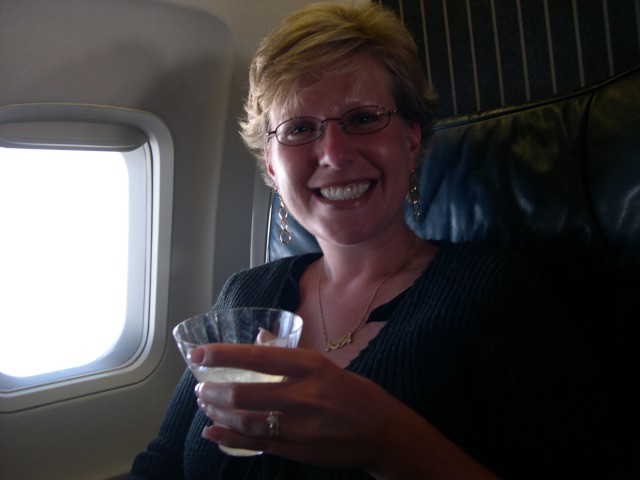 Jen and her Mile-High Mojito on the flight back