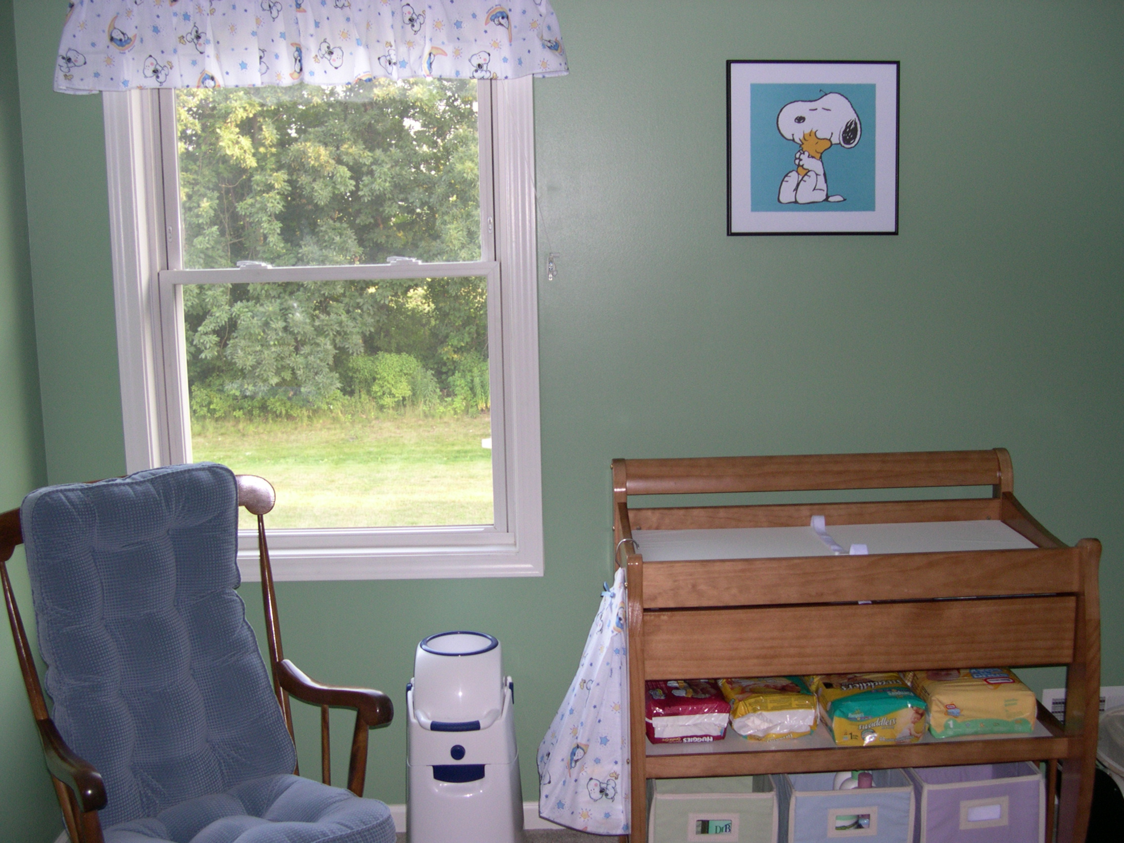 My mom's rocking chair, the Diaper Champ and changing table