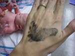 Nicky's footprint on Daddy's hand
