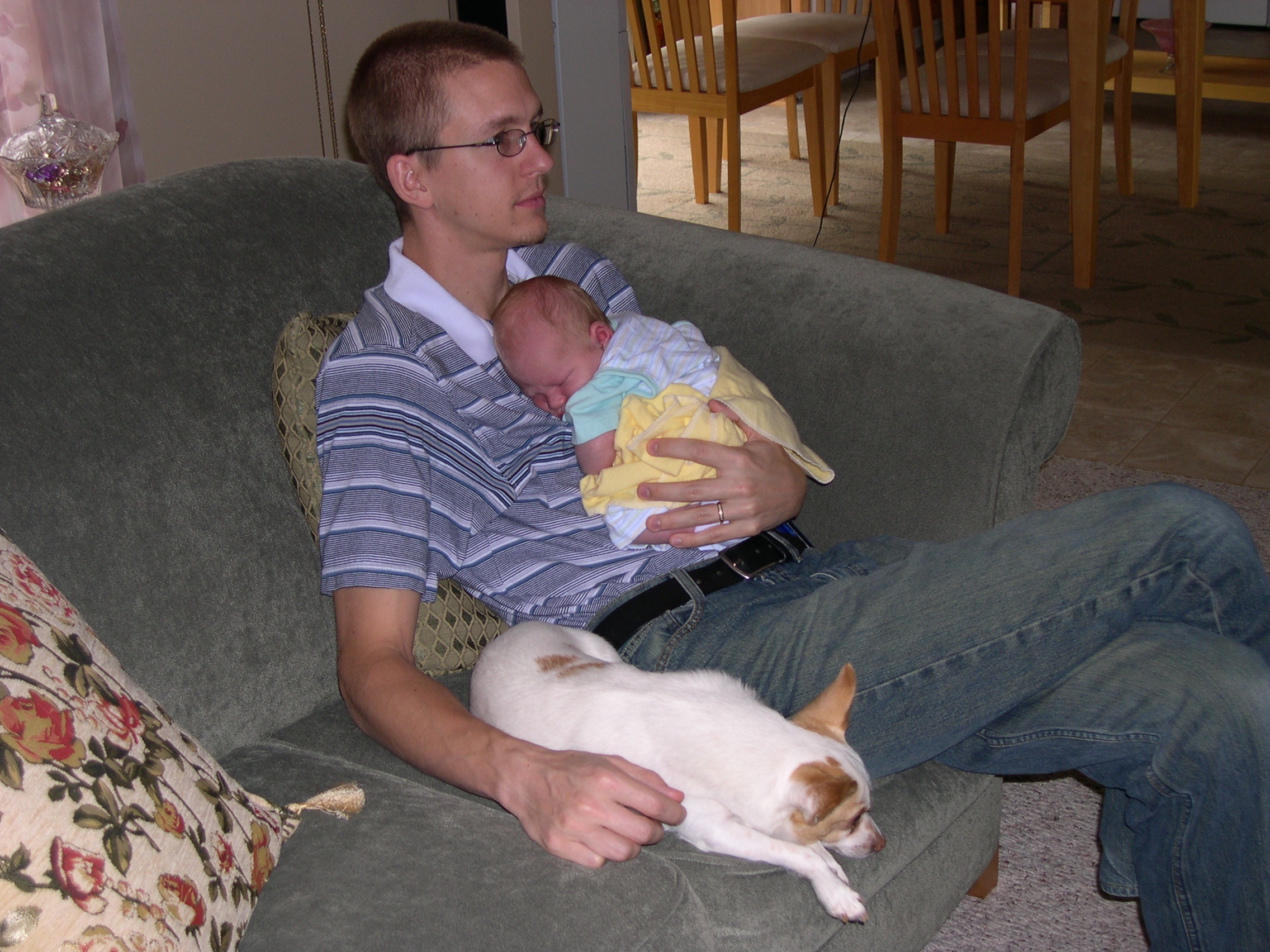 Nicky resting with Daddy and Keanu