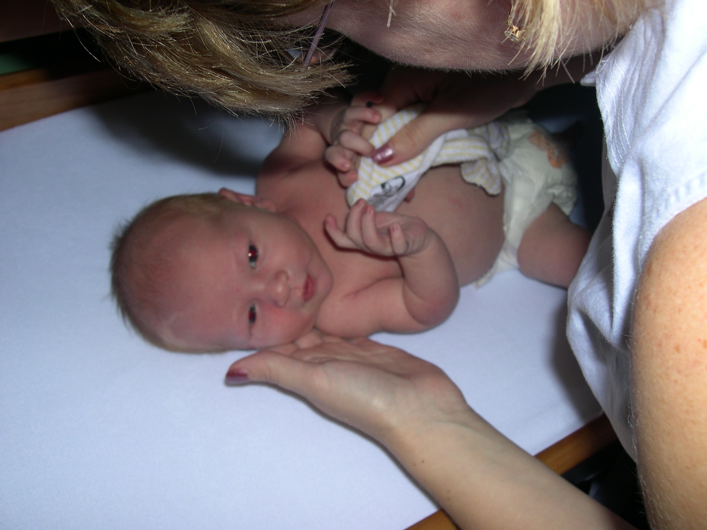 Nicky getting his first sponge bath at home!